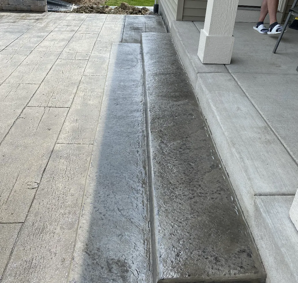 Stamped concrete backyard patio installed in Catoosa, Oklahoma